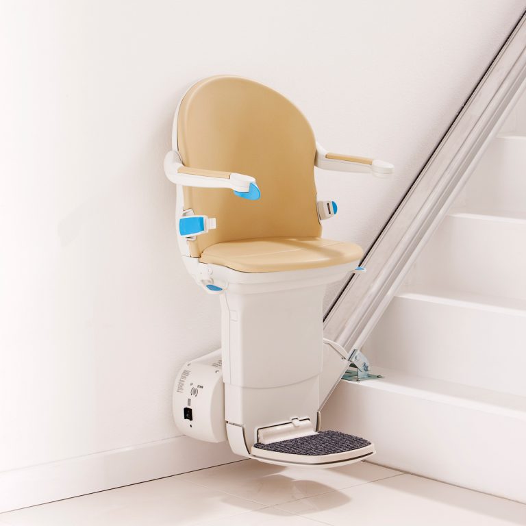 Stairlift positioned at the bottom of a staircase